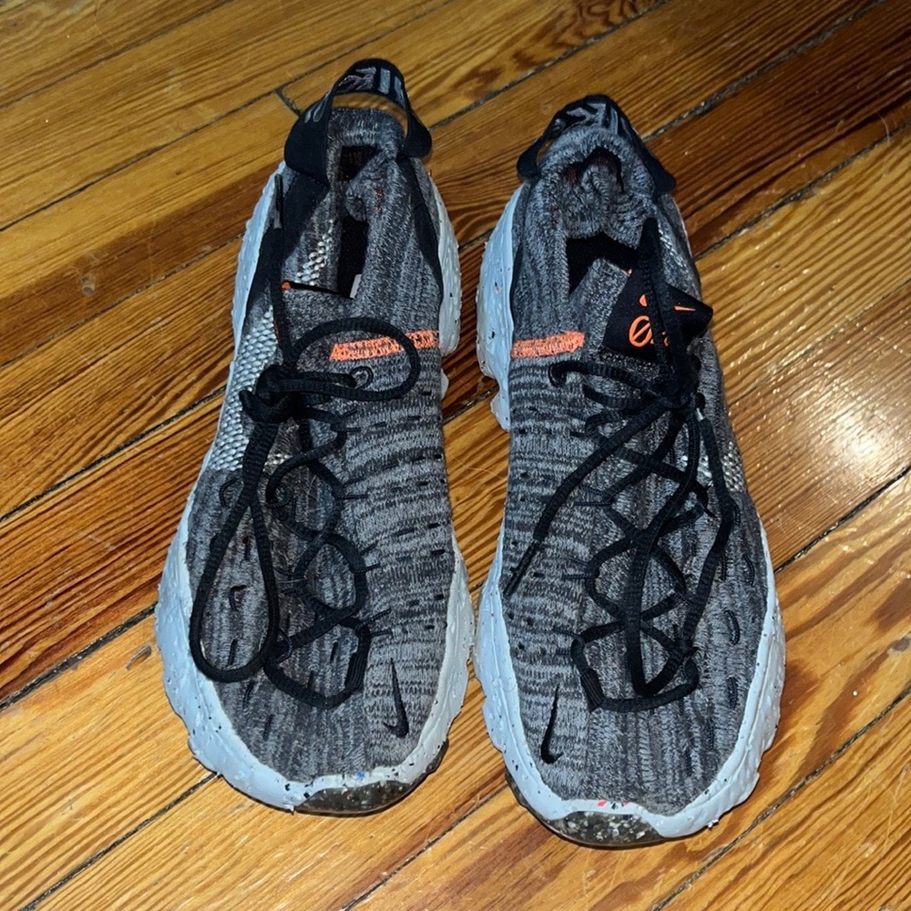Gently worn space hippie Nike sneaker